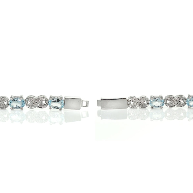 Sterling Silver Blue Topaz And Diamond Accent Infinity X & Oval Tennis Bracelet