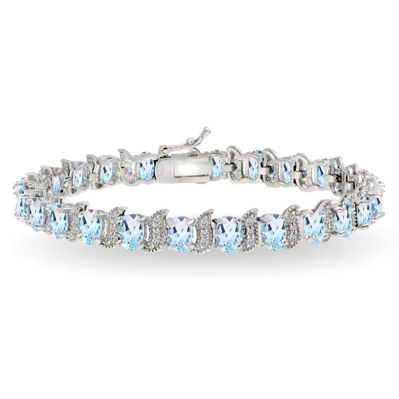 Sterling Silver Blue Topaz 6X4mm Oval And S Tennis Bracelet With White Topaz Accents