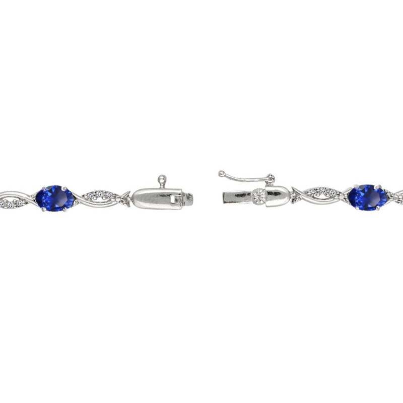 Sterling Silver Created Blue Sapphire And White Topaz Oval-Cut Swirl Tennis Bracelet
