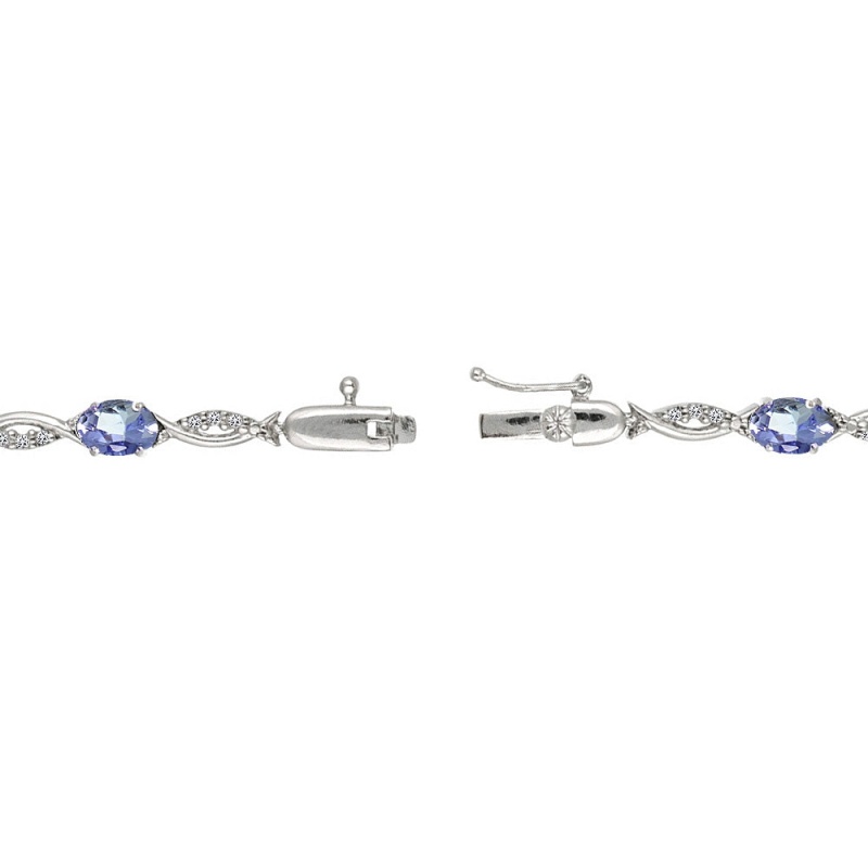 Sterling Silver Tanzanite And White Topaz Oval-Cut Swirl Tennis Bracelet