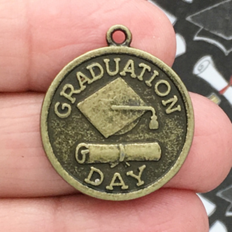 Graduation Charm With Graduation Cap And Diploma In Bronze Pewter
